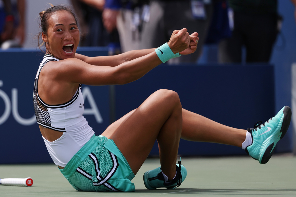 Zheng Qinwen, of China, celebrates after she won her match against Madison Keys, of the United States, during the third round of the U.S. Open tennis championships Saturday, Sept. 5, 2026, in New York. (AP Photo/Heather Khalifa)