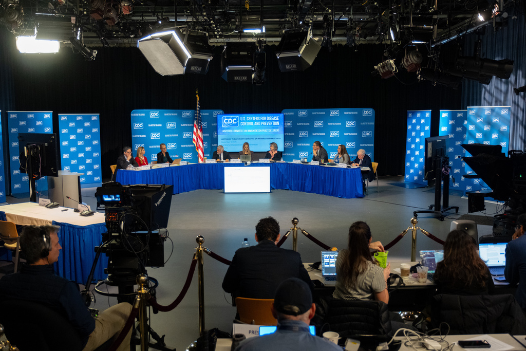 The CDC Advisory Committee on Immunization Practices meets in Atlanta on Friday, Dec. 5, 2025 to consider changes in hepatitis B vaccine recommendations for infants. (AP Photo/Ben Gray)