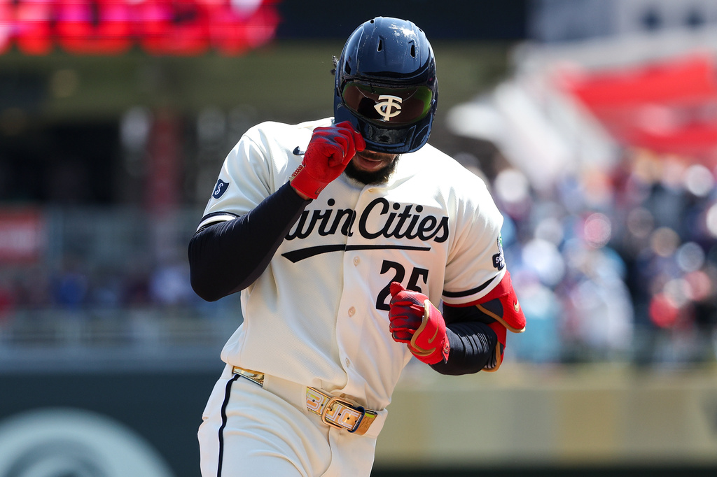Minnesota Twins' Byron Buxton celebrates his solo home run as he runs the bases during the first inning of a baseball game against the Toronto Blue Jays, Saturday, May 2, 2026, in Minneapolis. (AP Photo/Matt Krohn)