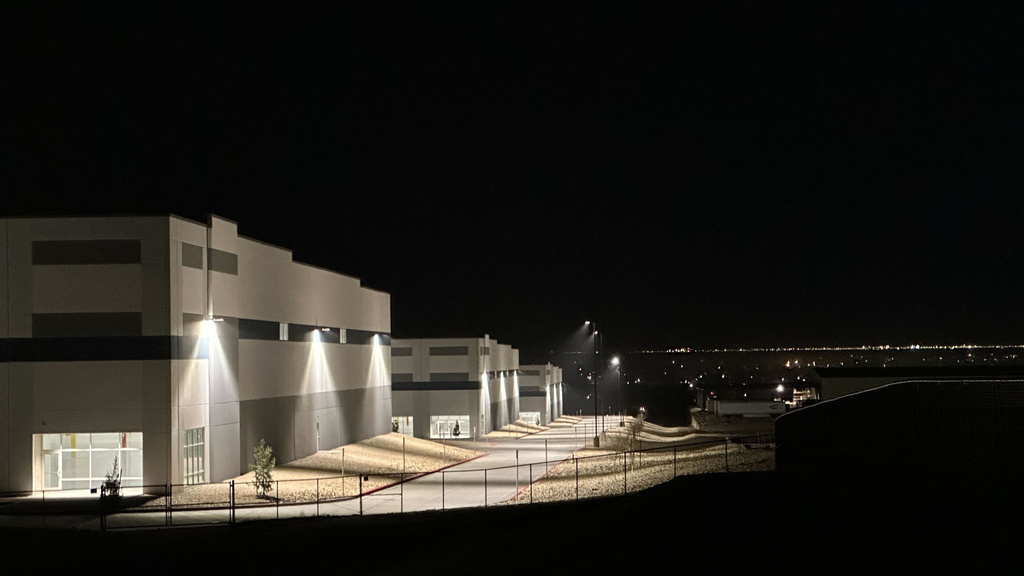 A massive 826,780-square-foot warehouse sits illuminated Feb. 12, 2026, in the El Paso suburb of Socorro, Texas, that was recently purchased by the U.S. Department of Homeland Security for $122.8 million. (ASP Photo/Morgan Lee)