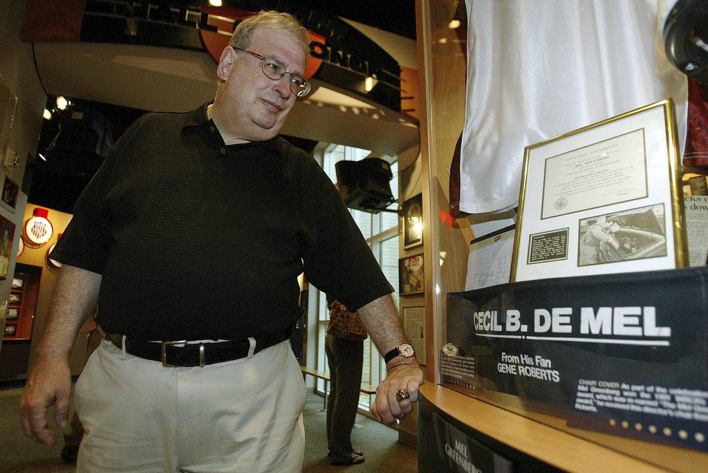FILE - Philadelphia Inquirer sportswriter Mel Greenberg looks at a display honoring him during a tour of the Women's Basketball Hall of Fame, Friday, June 8, 2007, in Knoxville, Tenn. (AP Photo/Wade Payne, File)