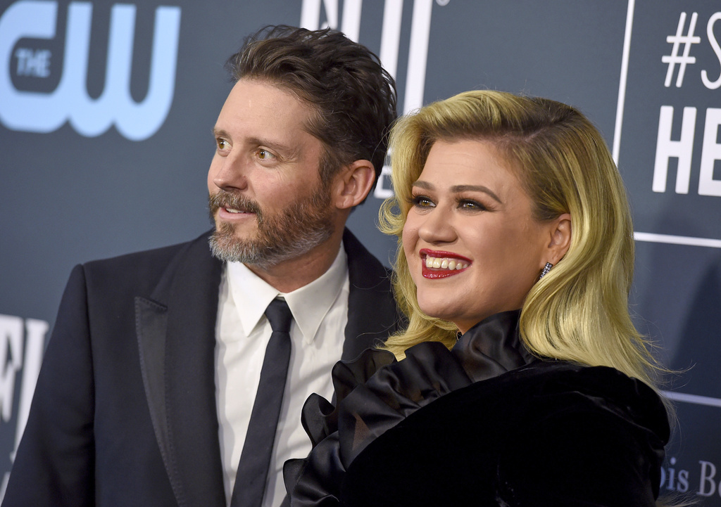 FILE - Brandon Blackstock, left, and Kelly Clarkson appear at the 25th annual Critics' Choice Awards in Santa Monica, Calif., on Jan. 12, 2020. (Photo by Jordan Strauss/Invision/AP, File)