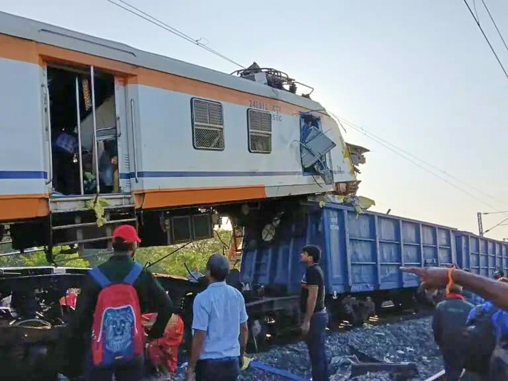 Rescuers work at the site of passenger train that crashed into a goods train, near Bilaspur, about 116 kilometers (72 miles) from Indian Chhattisgarh's state capital, Raipur, Tuesday, Nov. 4, 2025. (AP Photo/Ramgopal Thakur)