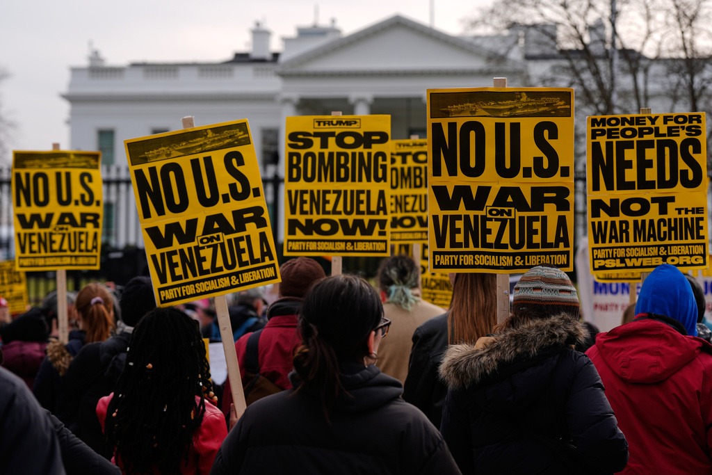 Protesters rally outside the White House Saturday, Jan. 3, 2026, in Washington, after the U.S. captured Venezuelan President Nicolás Maduro and his wife in a military operation. (AP Photo/Julia Demaree Nikhinson)