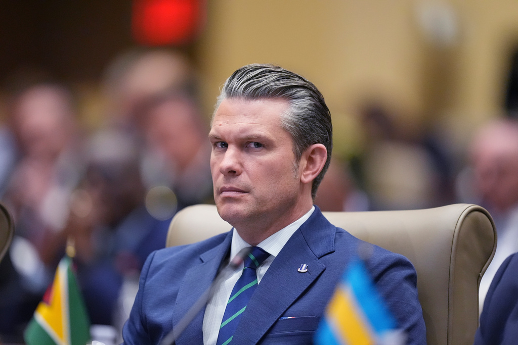 Defense Secretary Pete Hegseth listens during the inaugural Americas Counter Cartel Conference at U.S. Southern Command in Doral, Fla., Thursday, March 5, 2026. (AP Photo/Rebecca Blackwell)