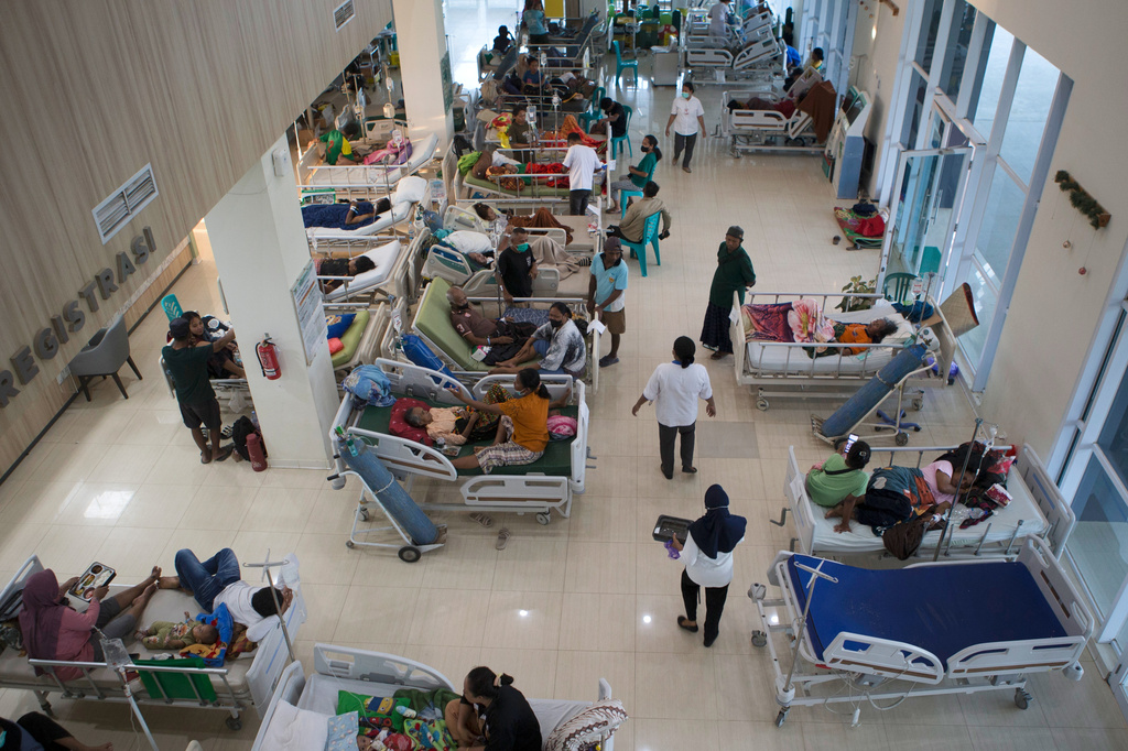 Patients are treated in the hallway of a hospital following an earthquake in Labuan Bajo, East Nusa Tenggara province, Indonesia, Saturday, Aug. 15, 2026. (AP Photo/Firdia Lisnawati)