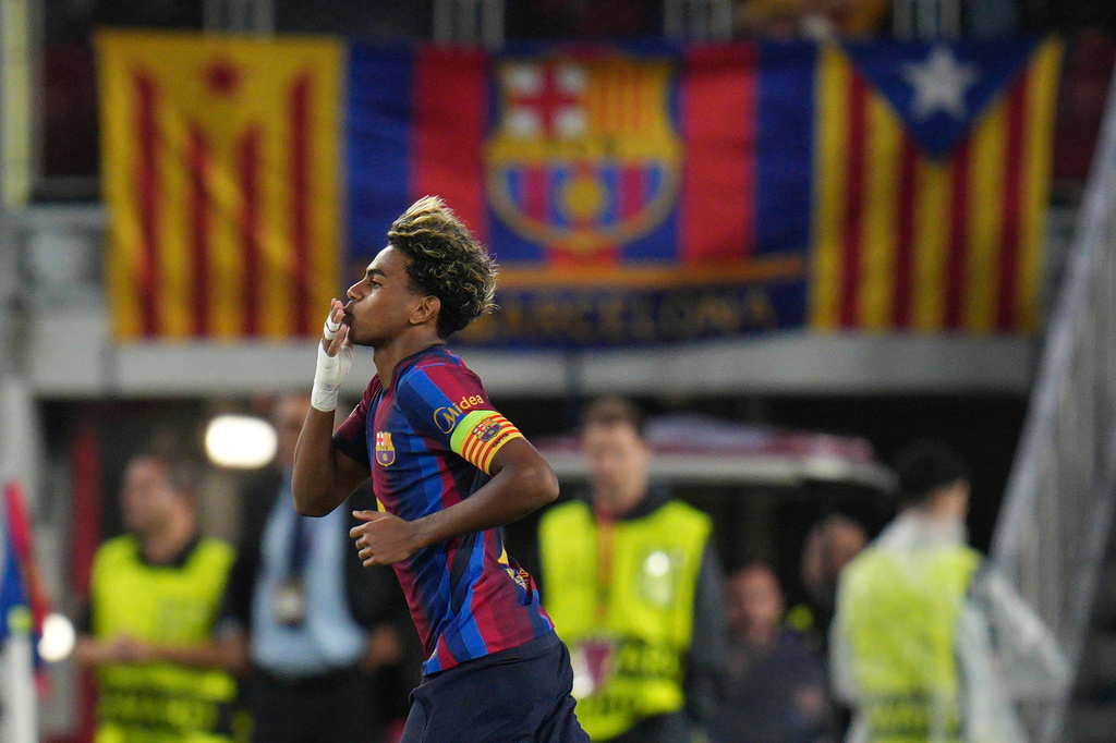 Barcelona's Lamine Yamal celebrates after scoring his side's fourth goal during the Champions League opening phase soccer between Barcelona and Feyenoord in Barcelona, Spain, Wednesday, Sept. 9, 2026.(AP Photo/Emilio Morenatti)