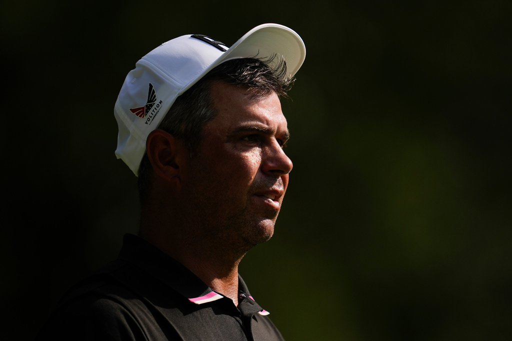Gary Woodland watches his ball from the fifth tee during the first round of the St. Jude Championship golf tournament, Thursday, Aug. 13, 2026, in Memphis, Tenn. (AP Photo/George Walker IV)