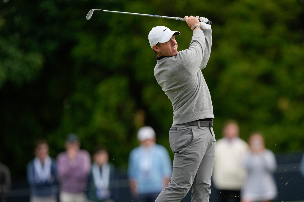 Rory McIlroy, of Northern Ireland, hits from the 13th fairway during the second round of the PGA Championship golf tournament at Aronimink Golf Club, Friday, May 15, 2026, in Newtown Square, PA. (AP Photo/Carolyn Kaster)