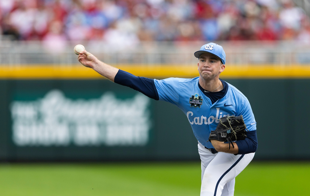 North Carolina starting pitcher Ryan Lynch throws against Oklahoma in the first inning of Game 2 of the NCAA College World Series baseball finals in Omaha, Neb., Sunday, June 21, 2026. (AP Photo/Rebecca S. Gratz)