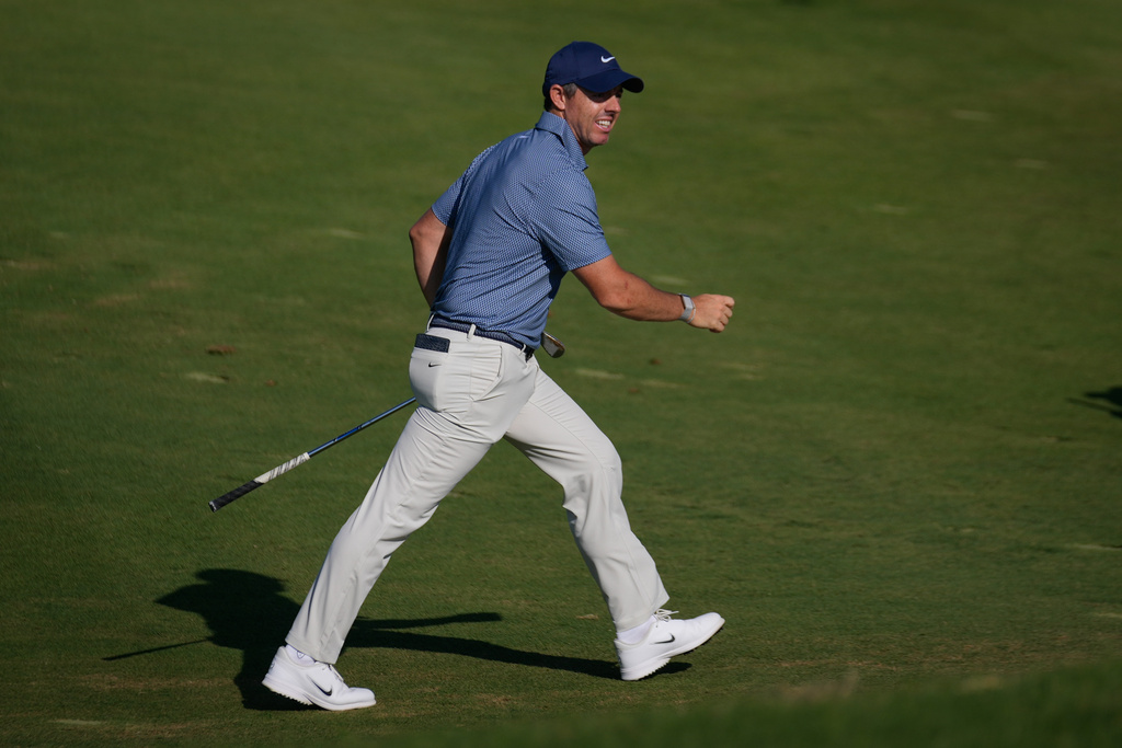Rory McIlroy of Northern Ireland walks after playing a second shot on the 15th hole during the final round of Dubai Invitational golf tournament in Dubai, United Arab Emirates, Sunday, Jan. 18, 2026. (AP Photo/Altaf Qadri)
