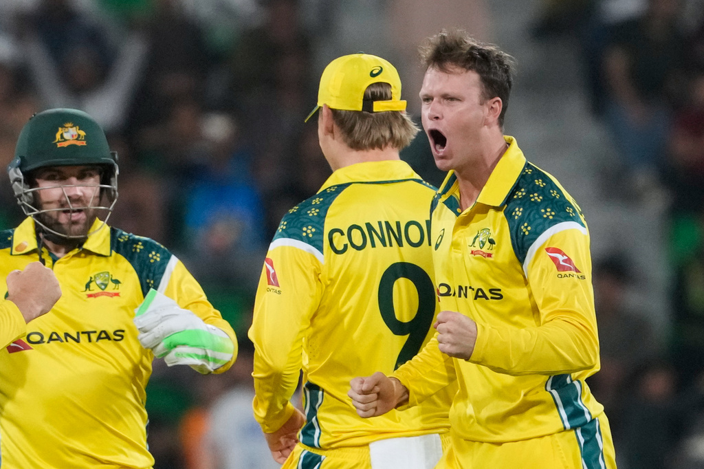 Australia's Matthew Kuhnemann, right, and teammates celebrates after the dismissal of Pakistan's Babar Azam during the third one-day international cricket match between Pakistan and Australia, in Lahore, Pakistan, Thursday, June 4, 2026. (AP Photo/K.M. Chaudary)