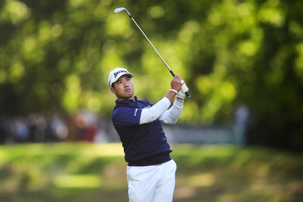 Japan's Hideki Matsuyama plays from the 17th fairway during the second round of the BMW PGA Championship golf tournament, Friday, Sept. 12, 2025, at Wentworth Golf Club in Virginia Water, England. (Adam Davy/PA via AP)