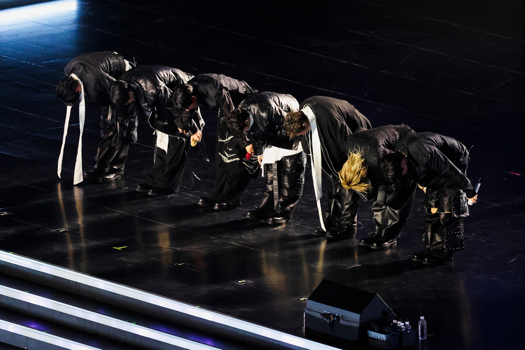 Kpop group BTS bows at the end of their 'BTS The Comeback Live Arirang' concert in central Seoul, South Korea, March 21, 2026. (Kim Hong-Ji/Pool Photo via AP)