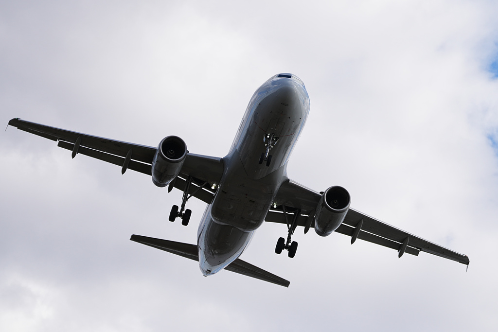 An aircraft approaches Philadelphia International Airport in Philadelphia, Thursday, Nov. 6, 2025. (AP Photo/Matt Rourke)