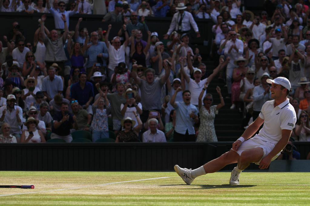 Arthur Fery of Britain reacts to winning against Flavio Cobolli of Italy in their quarter-final men's singles match at the Wimbledon Tennis Championships in London, Wednesday, July 8, 2026. (AP Photo/Brian Inganga)