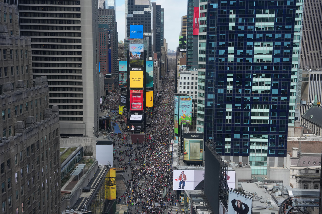 People take part in a "No Kings" protest Saturday, March 28, 2026, in New York. (AP Photo/Adam Gray)