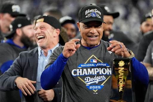 Los Angeles Dodgers manager Dave Roberts celebrates their win against the Milwaukee Brewers in baseball's National League Championship Series, Friday, Oct. 17, 2025, in Los Angeles. (AP Photo/Brynn Anderson) Los Angeles Dodgers manager Dave Roberts celebrates their win against the Milwaukee Brewers in baseball's National League Championship Series, Friday, Oct. 17, 2025, in Los Angeles. (AP Photo/Brynn Anderson)