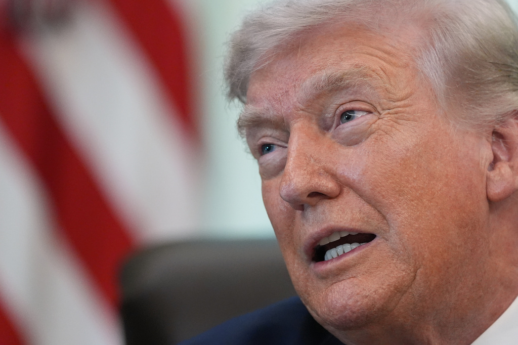 President Donald Trump speaks in the Oval Office of the White House before signing an executive order Tuesday, March 31, 2026, in Washington. (AP Photo/Alex Brandon)