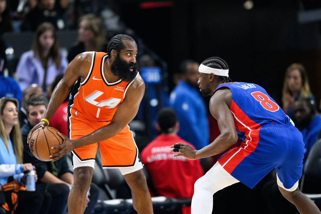Los Angeles Clippers guard James Harden (1) looks to drive the ball against Detroit Pistons guard Caris Levert (8) during the first half of an NBA basketball game, Sunday, Dec. 28, 2025, in Inglewood, Calif. (AP Photo/William Liang)