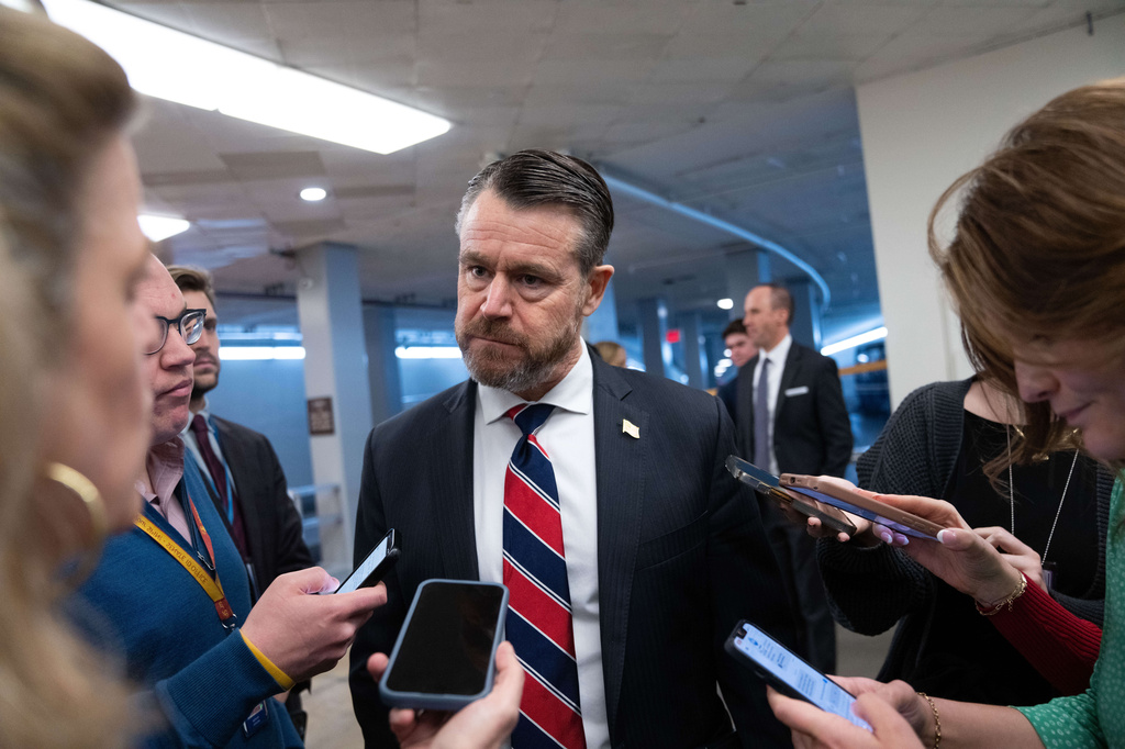 FILE - Sen. Todd Young, R-Ind., departs following votes at the Capitol, March 5, 2026, in Washington. (AP Photo/Allison Robbert, File)