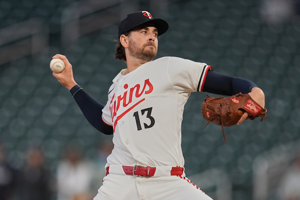 Minnesota Twins starting pitcher Dean Kremer delivers during the first inning of a baseball game against the New York Yankees, Monday, Sept. 14, 2026, in Minneapolis. (AP Photo/Abbie Parr)