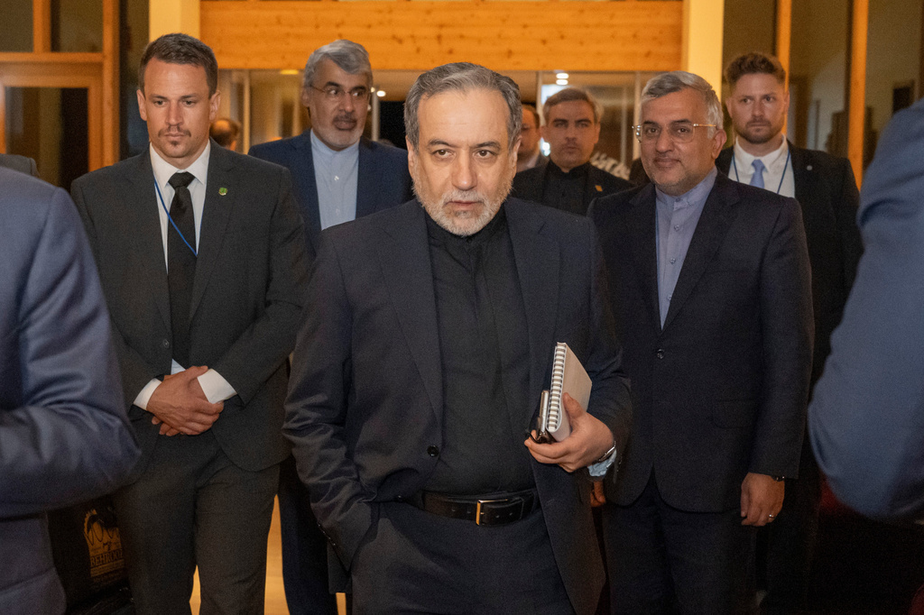 Iranian Foreign Minister Seyyed Abbas Araghchi, center, arrives at the Buergenstock resort in Obbuergen, near Lucerne, Switzerland, early Sunday, June 21, 2026. (Urs Flueeler/Keystone, Pool via AP)