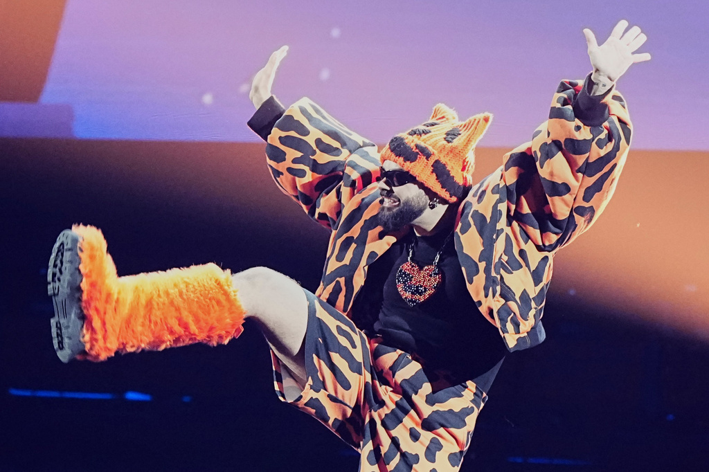 Akylas from Greece performs the song "Ferto" during the dress rehearsal for the Grand Final of the 70th Eurovision Song Contest in Vienna, Austria, Friday, May 15, 2026. (AP Photo/Martin Meissner)