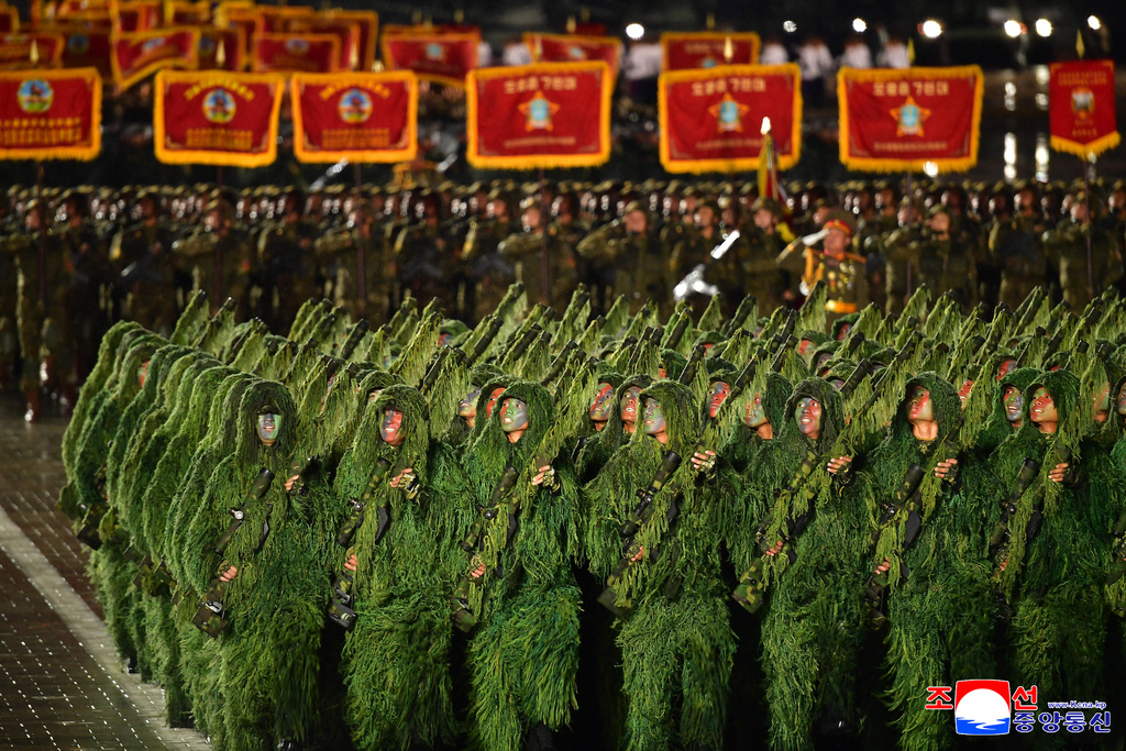 In this photo provided by North Korean government, soldiers march during the military parade marking the 80th anniversary of the founding of the ruling Worker's Party, in Pyongyang, North Korea, Friday, Oct. 10, 2025. Independent journalists were not given access to cover the event depicted in this image distributed by the North Korean government. The content of this image is as provided and cannot be independently verified. Korean language watermark on image as provided by source reads: "KCNA" which is the abbreviation for Korean Central News Agency. (Korean Central News Agency/Korea News Service via AP)
