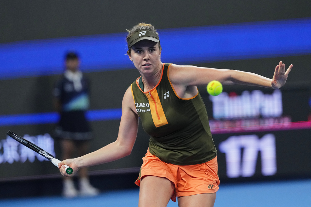 Linda Noskova, of the Czech Republic prepares to return a shot from Jessica Pegula, of the United States during the women's singles semifinals match of the China Open tennis tournament, at the National Tennis Center, in Beijing, Saturday, Oct. 4, 2025. (AP Photo/Andy Wong)