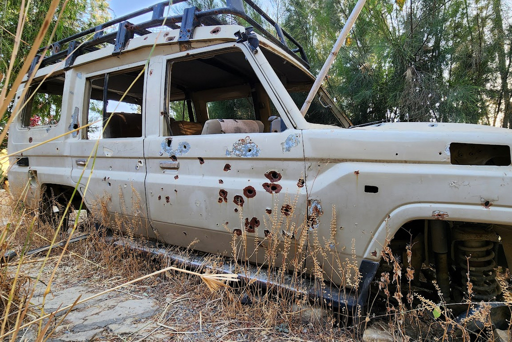 A bullet-riddled vehicle sits abandoned on the grounds of Wukro Lodge, once occupied by Eritrean troops, in the Tigray region of northern Ethiopia, on Jan. 26, 2026. (AP Photo/Jody Ray)