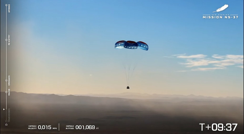 This image provided by Blue Origin, parachutes deploy to carry the Blue Origin's capsule to the ground after liftoff on Saturday, Dec. 20, 2025 in West Texas. (Blue Origin via AP)