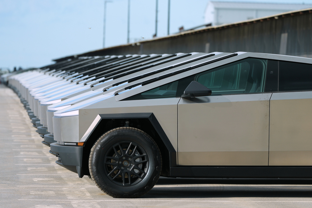 FILE - New Tesla Cybertrucks are seen at SpaceX's Starship facility in Starbase, Texas, Monday, Oct. 13, 2025. (AP Photo/Eric Gay, File)