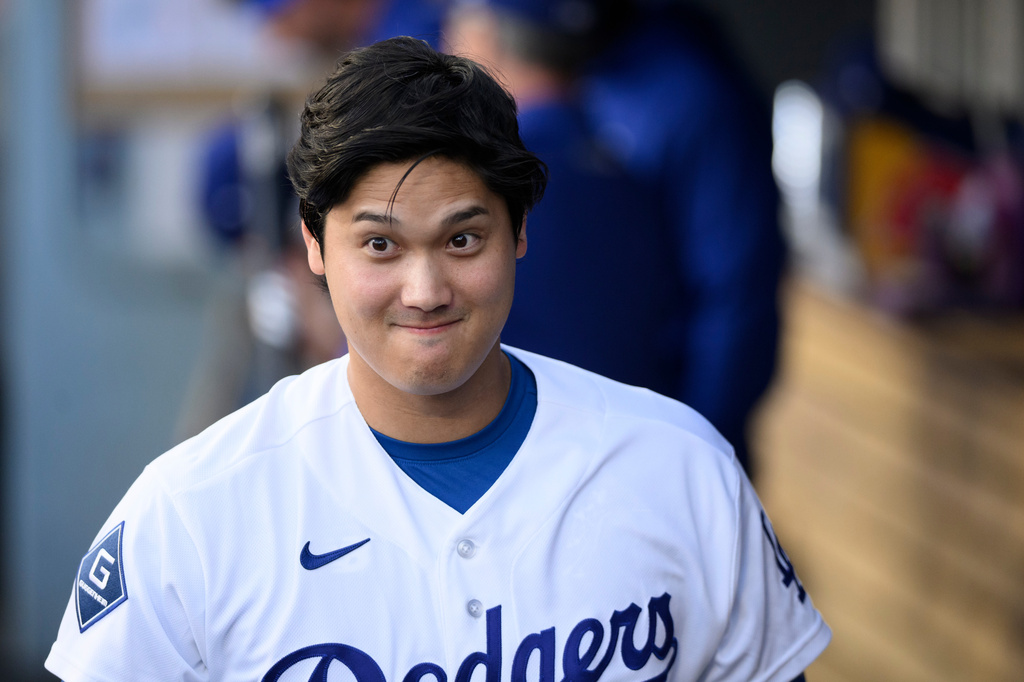 Los Angeles Dodgers' Shohei Ohtani reacts before a baseball game against the San Diego Padres in Los Angeles, Thursday, July 2, 2026. (AP Photo/Kyusung Gong)