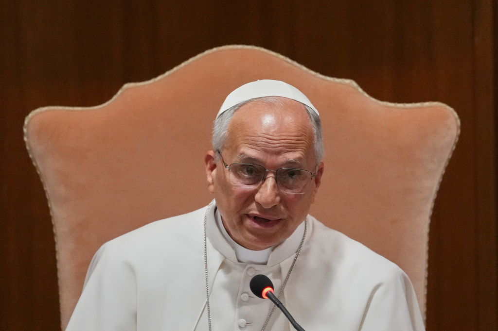 Pope Leo XIV speaks during the presentation of his first encyclical, "Magnifica humanitas: On Safeguarding the Human Person in the Time of Artificial Intelligence," at the Vatican, Monday, May 25, 2026. (AP Photo/Alessandra Tarantino)