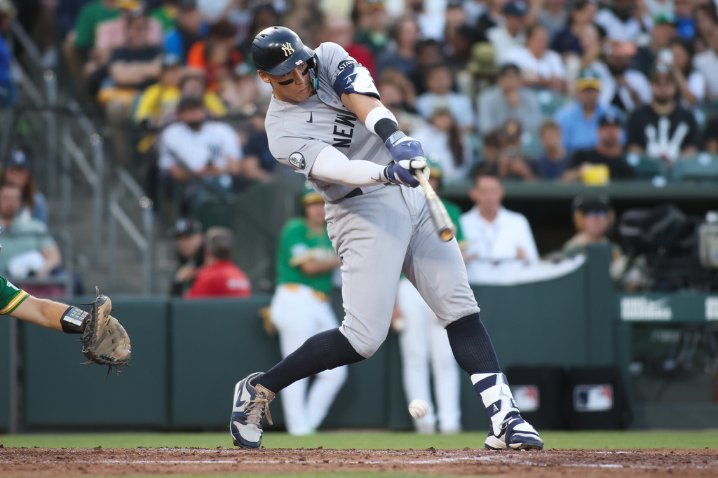 New York Yankees' Aaron Judge hits an RBI as he grounds out during the fourth inning of a baseball game against the Athletics, Friday, May 29, 2026, in West Sacramento, Calif. (AP Photo/Scott Marshall)