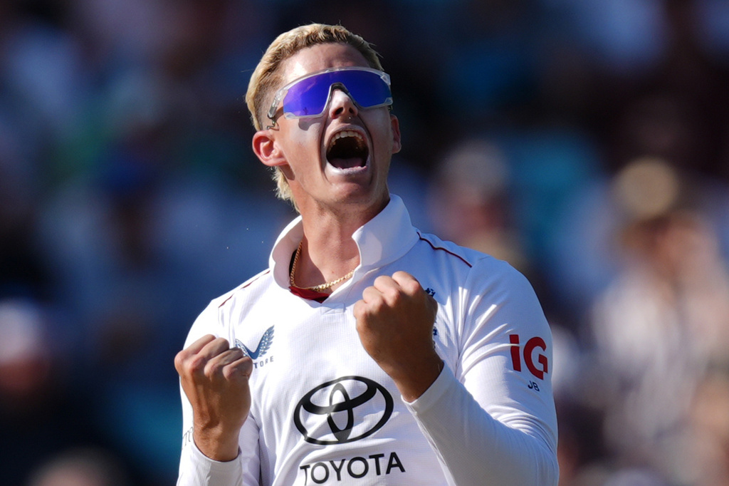 England's Jacob Bethell celebrates taking the wicket of New Zealand's Rachin Ravindra lbw on day three of the second cricket test between England and New Zealand, in London, Friday June 19, 2026. (Ben Whitley/PA via AP)