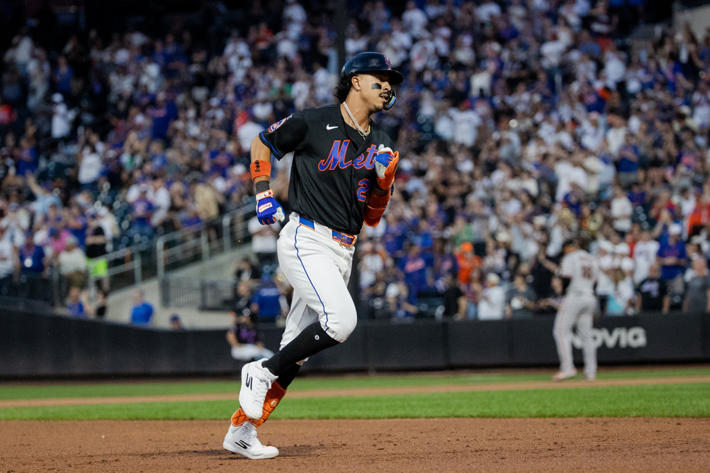 New York Mets' Mark Vientos runs after hitting a three-run home run during the first inning of a baseball game against the San Francisco Giants, Friday, Sept. 4, 2026, in New York. (AP Photo/Angelina Katsanis)