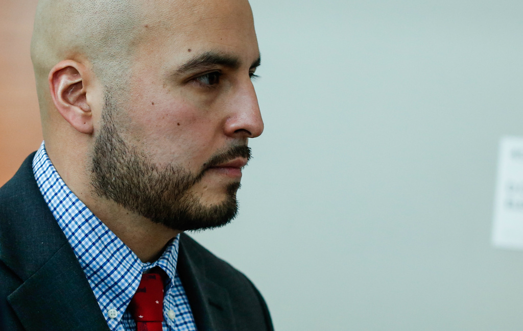 New York police officer Erik Duran who is charged with hurling a plastic cooler at a man fleeing officers on a motorized scooter, causing a crash that killed the driver, arrives to his manslaughter trial at the Bronx Criminal Court in New York, Friday, Feb. 6, 2026. (AP Photo/Kena Betancur)