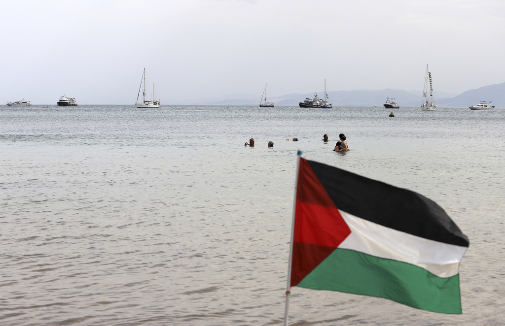 Ships that are part of the Global Sumud Flotilla heading to Gaza are anchored off the coast of of Sidi Bou Saïd in Tunis, Tunisia, Tuesday, Sept. 9, 2025. (AP Photo/Anis Mili)