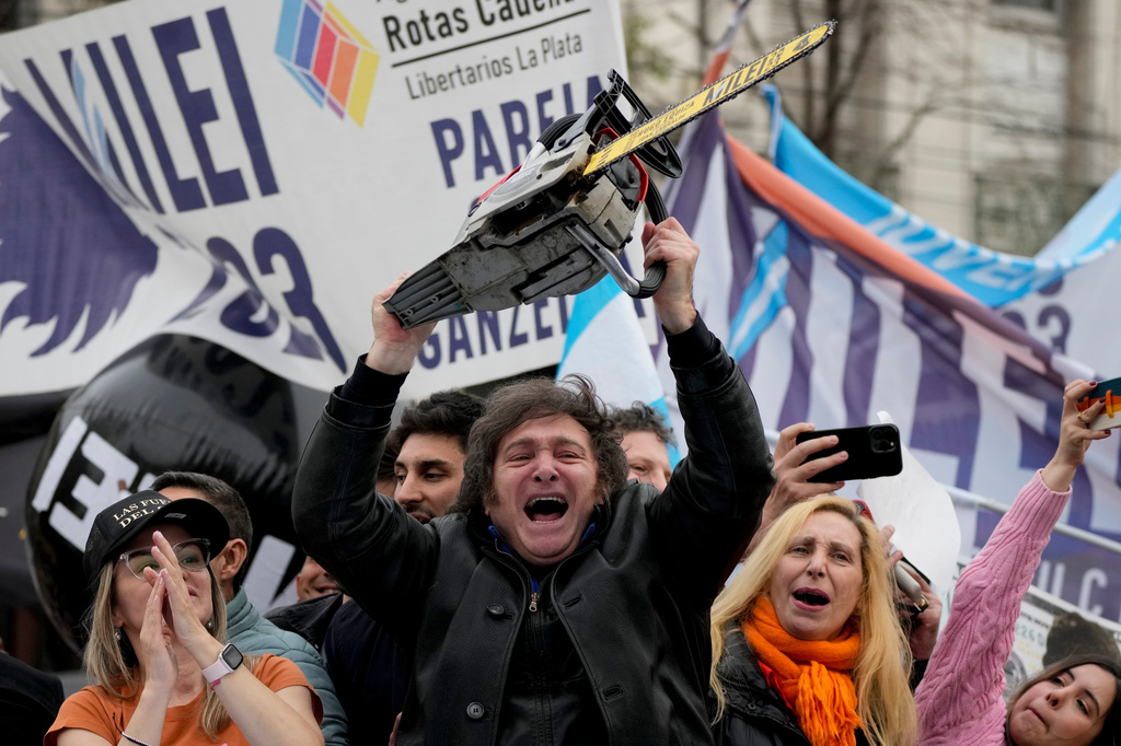 FILE - Presidential hopeful of the Liberty Advances coalition Javier Milei brandishes a chainsaw during a rally in La Plata, Argentina, Sept. 12, 2023.(AP Photo/Natacha Pisarenko, File)