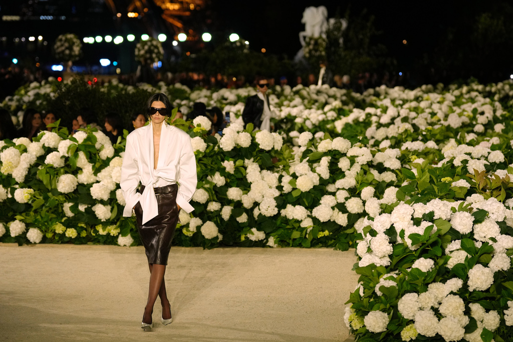 A model wears a creation as part of the Saint Laurent Spring/Summer 2026 collection presented in Paris, Monday, Sept. 29, 2025. (AP Photo/Aurelien Morissard)