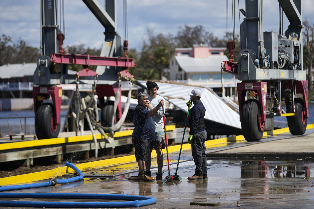 Supplies, emergency workers rushed to North Carolina while Florida digs