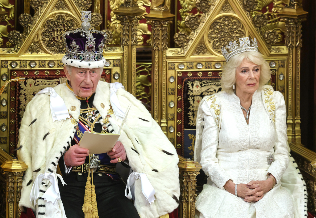 FILE - Britain's King Charles III and Queen Camilla attend the state opening of Parliament at the Palace of Westminster in London, Wednesday, May 13, 2026. (Chris Jackson/Pool Photo via AP, File)