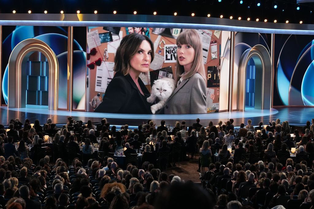 Host Mariska Hargitay left, and Taylor Swift in a "Law and Order: SVU" skit during the 78th Emmy Awards on Monday, Sept. 14, 2026, at the Peacock Theater in Los Angeles. (AP Photo/Chris Pizzello)