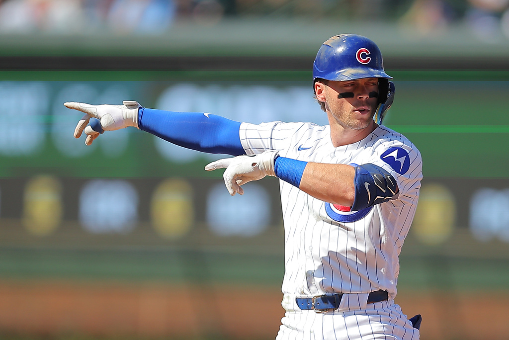 Chicago Cubs' Nico Hoerner celebrates his double during the fourth inning of a baseball game against the Pittsburgh Pirates, Friday, Sept. 11, 2026, in Chicago. (AP Photo/Melissa Tamez)
