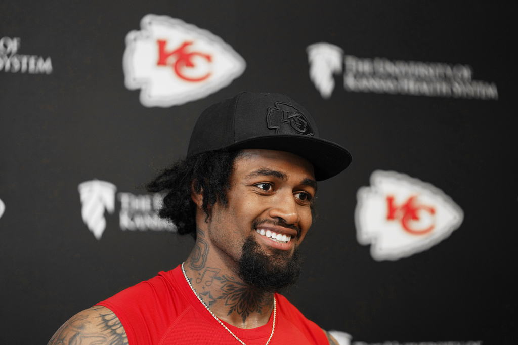 FILE - Kansas City Chiefs tackle Josh Simmons talks with members of the media after an NFL football team's practice, June 9, 2026, in Kansas City, Mo. (AP Photo/Ed Zurga, File)