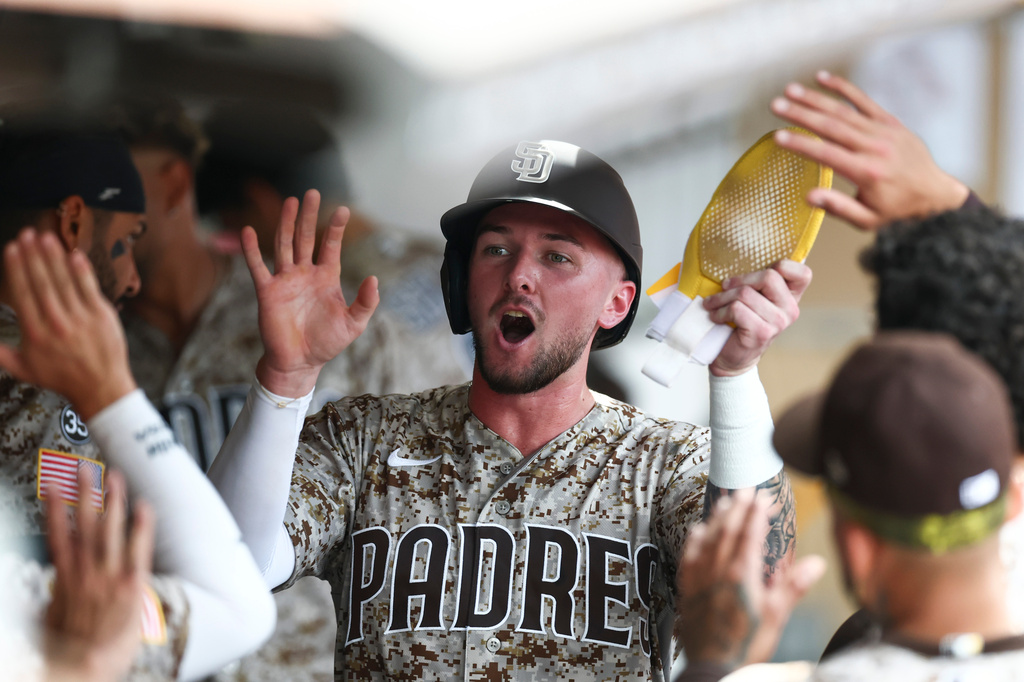 San Diego Padres' Jackson Merrill celebrates after scoring off Jake Cronenworth's double in the fourth inning of a baseball game against the Miami Marlins, Sunday, Sept. 20, 2026, in San Diego. (AP Photo/Karl Anderson)
