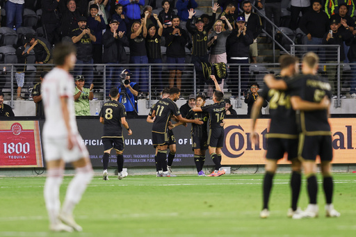 Los Angeles FC midfielder Frankie Amaya celebrates with midfielder Marco Delgado (8), midfielder Timothy Tillman (11) and defender Sergi Palencia (14) after scoring a goal as Toronto FC forward Theo Corbeanu, left, watches, and Los Angeles FC midfielder Ryan Hollingshead (24) and defender Ryan Porteous, right, embrace during the second half of an MLS soccer match, Wednesday, Oct. 8, 2025, in Los Angeles. (AP Photo/Jessie Alcheh) Los Angeles FC midfielder Frankie Amaya celebrates with midfielder Marco Delgado (8), midfielder Timothy Tillman (11) and defender Sergi Palencia (14) after scoring a goal as Toronto FC forward Theo Corbeanu, left, watches, and Los Angeles FC midfielder Ryan Hollingshead (24) and defender Ryan Porteous, right, embrace during the second half of an MLS soccer match, Wednesday, Oct. 8, 2025, in Los Angeles. (AP Photo/Jessie Alcheh)