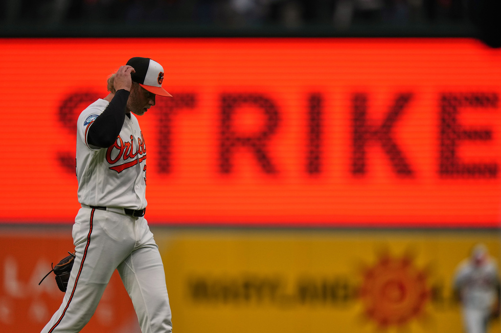 Baltimore Orioles starting pitcher Shane Baz returns to the dugout after striking out Houston Astros' Brice Matthews to retire the side during the second inning of a baseball game, Tuesday, April 28, 2026, in Baltimore. (AP Photo/Stephanie Scarbrough)
